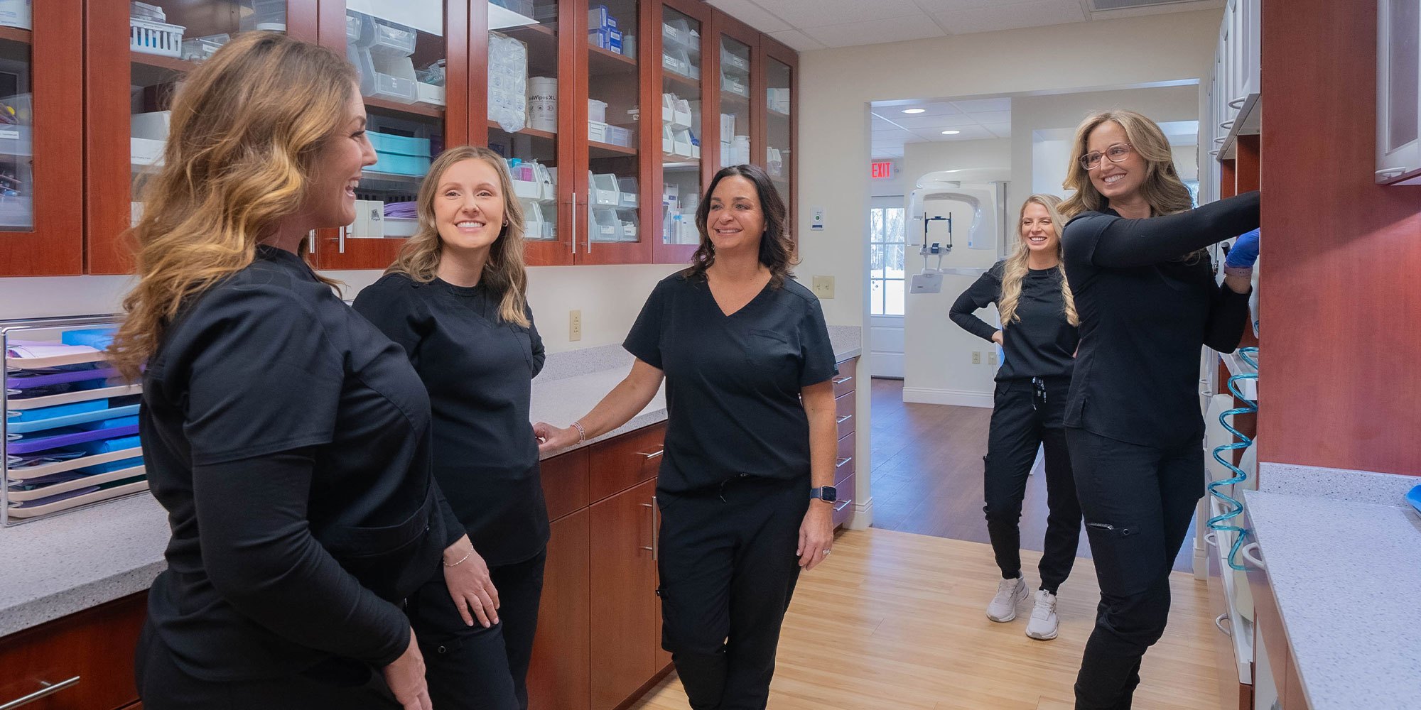 team member laughing talking to each other