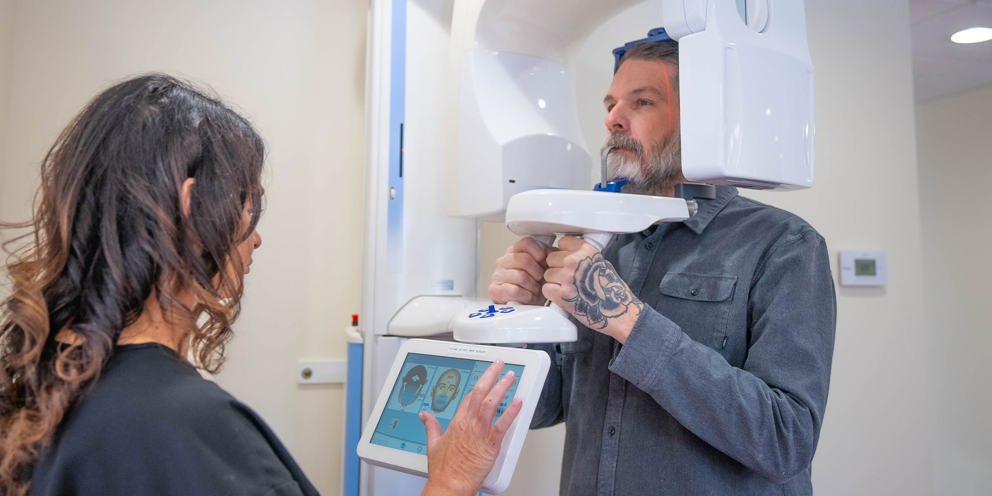 patient taking a x-ray of their teeth